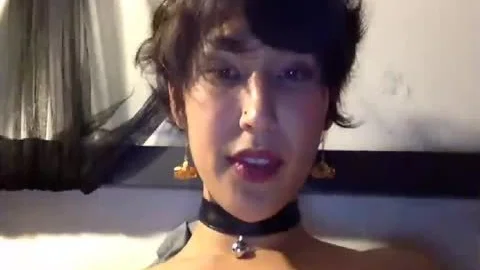 naughty girl In Belled Choker Orgasms Intensely