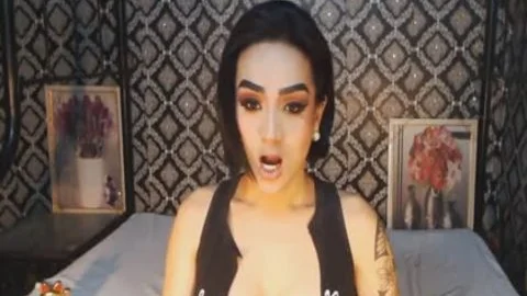 Tattooed wild sheboy Faps Her Stiffed Boner